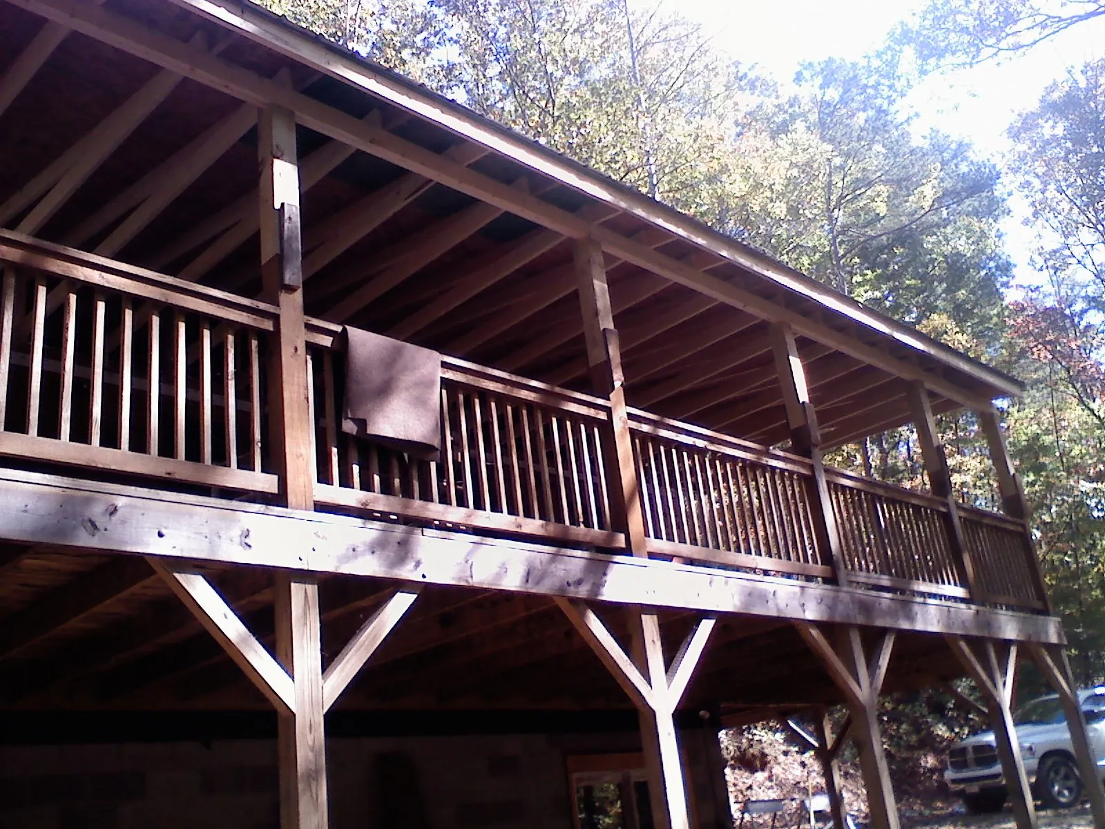 Timber framing under a new elevated porch and deck — Roof Leak Repair in Maben by Roofing Brothers
